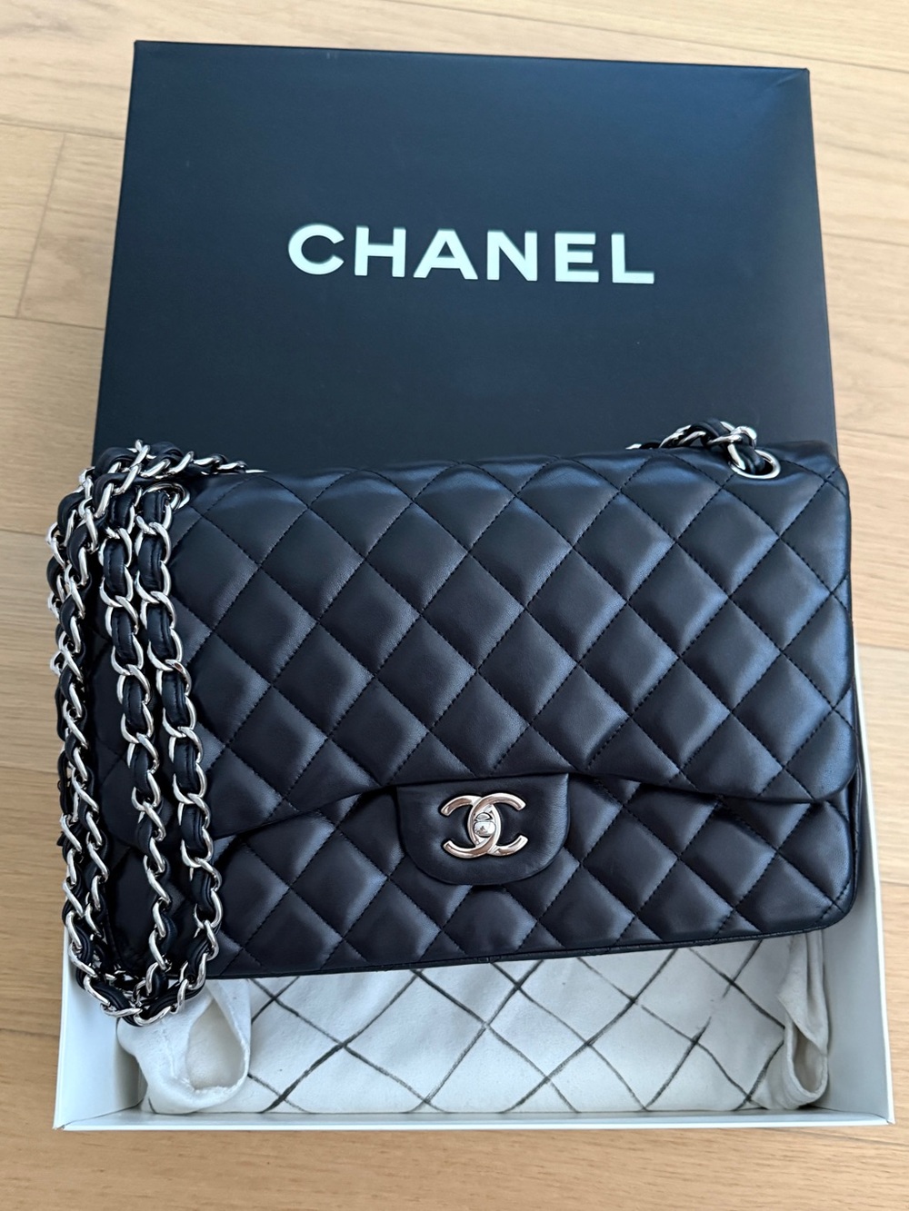 2011 CHANEL JUMBO LAMBSKIN
CLASSIC BAG BLACK WITH SILVER HARDWARE